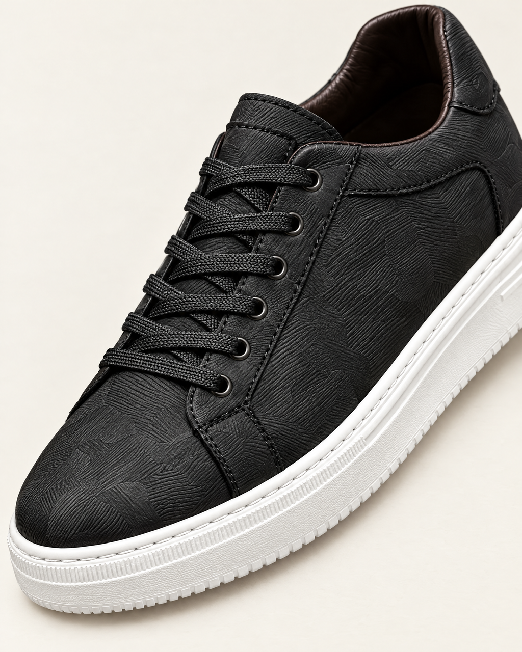 The Savona in Black, embossed leather detail
