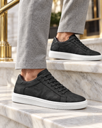 The Savona in Black, worn on marble steps