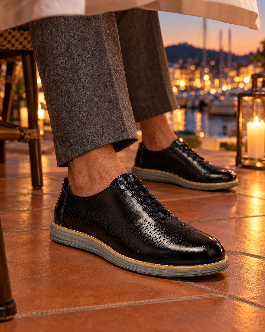 The Padova in Black, worn at a terrace dinner table