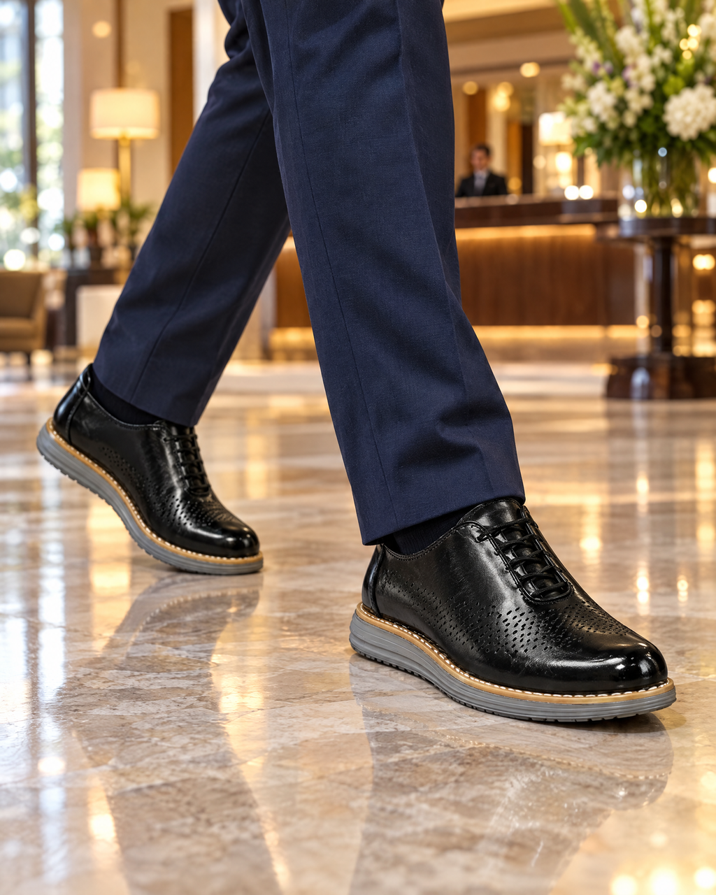 The Padova in Black, worn in a hotel lobby
